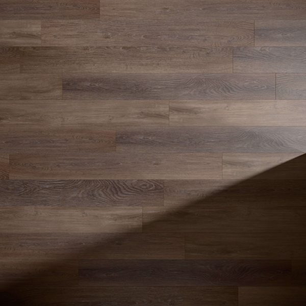 Sydney Oak* features a dark brown wooden floor with visible grain patterns and staggered planks. A diagonal shadow crosses the lower right corner, emphasizing the texture and natural variation of the Sydney Oak* surface.