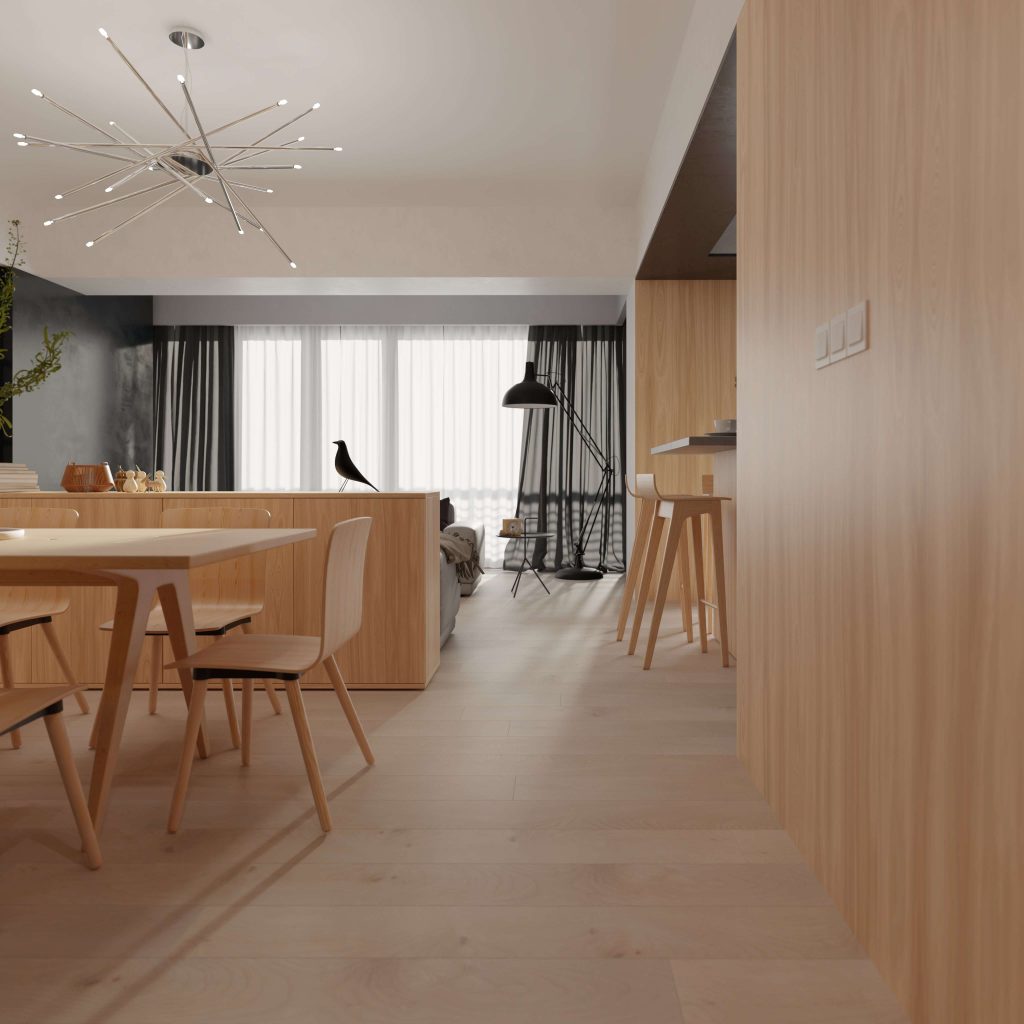 The Agassi* features a modern open-plan living and dining area with light wood furniture and flooring, a round dining table and chairs, black accent chair, minimalist chandelier, and large windows with sheer curtains.