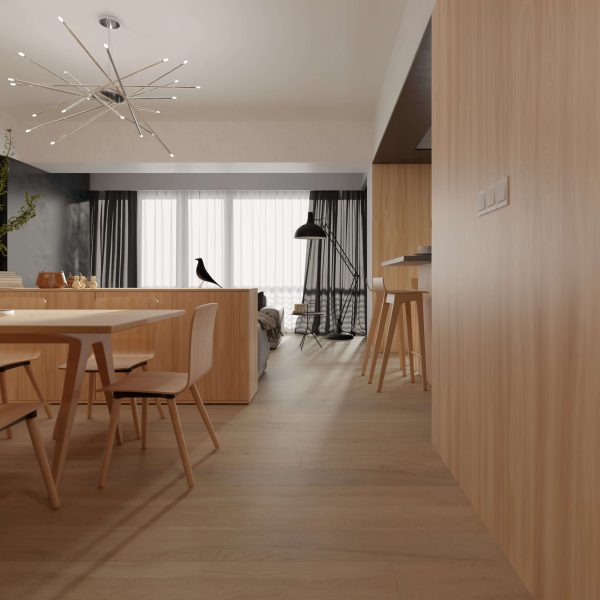 A modern, minimalistic living and dining area features Topspin light wood furniture and flooring, a round dining table with chairs, a contemporary chandelier, large windows with sheer curtains, and a black floor lamp.
