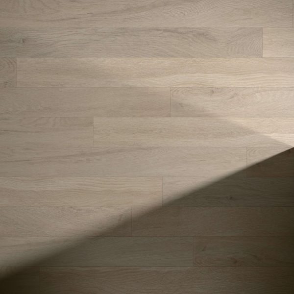 Topspin flooring features light-colored wooden planks with a diagonal shadow across the surface, highlighting the contrast between illuminated and shaded areas.