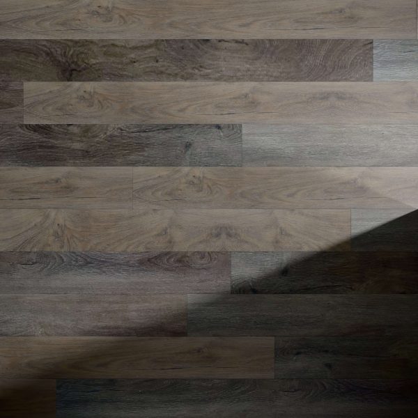 A close-up of Osaka wooden floorboards shows their natural, textured grain in varying brown shades, with a diagonal shadow across the bottom right corner.