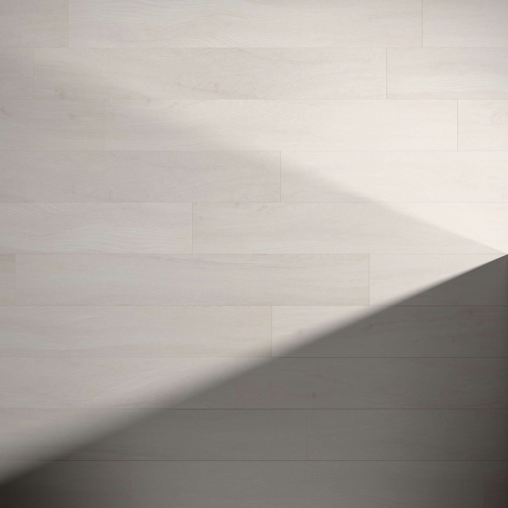 Paris Oak flooring features a light wood tone with a distinct shadow cast diagonally across the lower right corner, highlighting the sharp contrast between its illuminated and shaded areas.