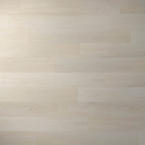 Turin Oak features light-colored, elongated rectangular planks arranged in a staggered pattern. The smooth surface highlights subtle wood grain and natural tonal variations for an elegant appearance.