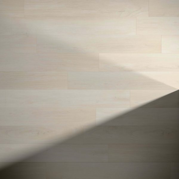 Turin Oak floorboards in a light finish feature visible wood grain and texture, with diagonal shadows across the lower right corner that highlight the contrast between illuminated and shaded areas.
