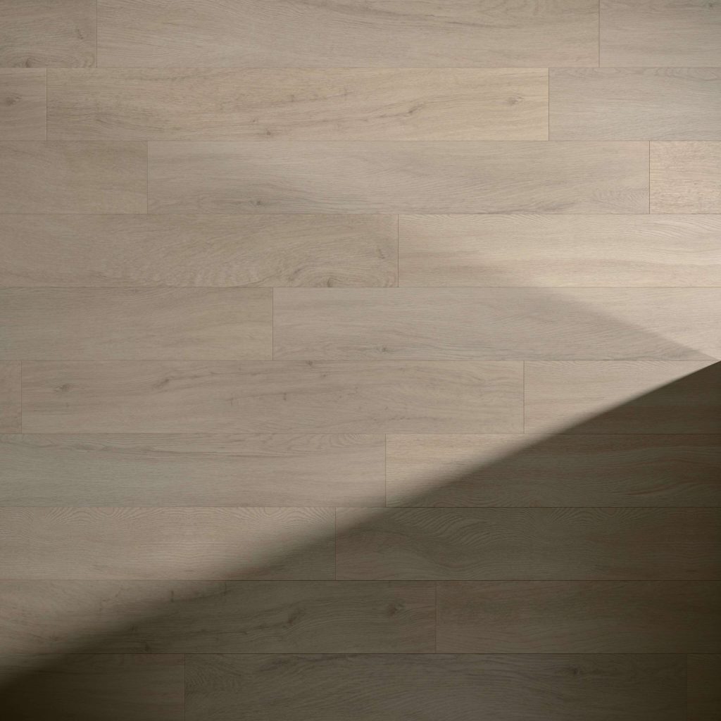 Athens Oak floorboards feature a light color and natural grain, partially covered by a diagonal shadow from the lower left corner, creating striking contrast between illuminated and shaded areas.