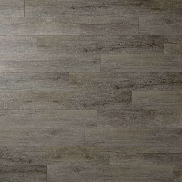 Bourque* features gray wooden floor planks arranged in a staggered pattern, highlighting natural wood grain texture and knots across the surface.
