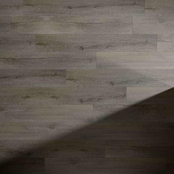 Bourque* features medium brown wooden planks with subtle wood grain patterns and a diagonal shadow crossing the lower right corner.