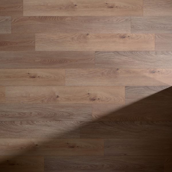 The Modano* features a light brown wooden floor with visible grain and knot patterns. A diagonal shadow covers the lower right corner, adding contrast to the evenly lit surface.