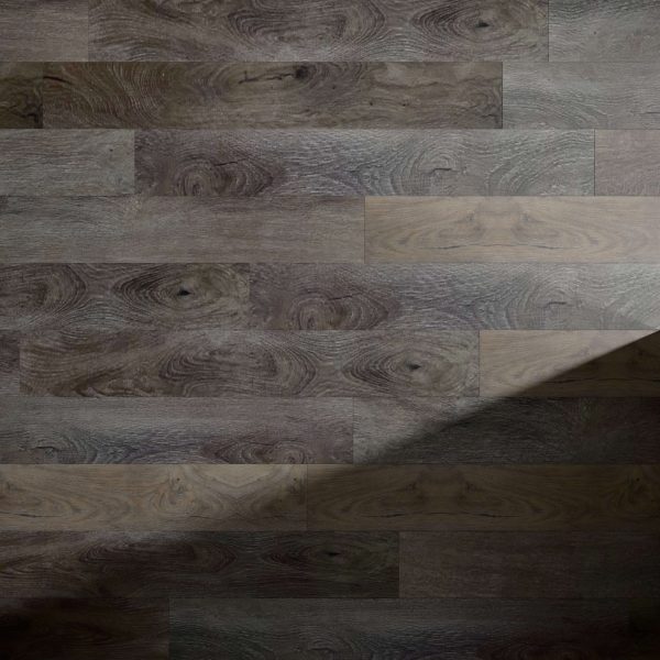 A close-up of Mikita wooden floorboards showcases their natural grain pattern. A diagonal shadow covers the lower right corner, adding contrast to the otherwise evenly lit surface.