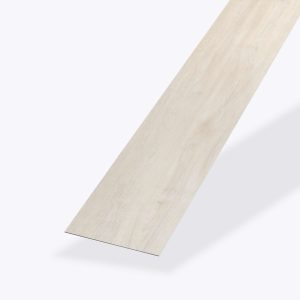 A single Whistler Oak rectangular vinyl plank is displayed on a plain white background at a slight angle, highlighting its light wood-look texture and thin profile.