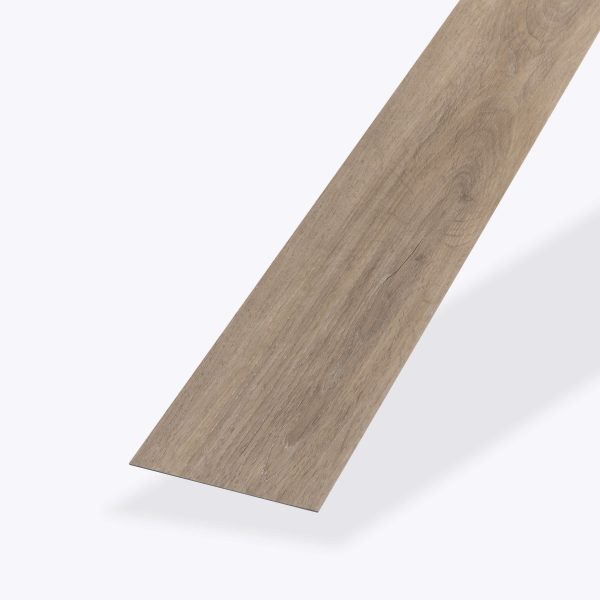 A single Tokyo Oak* rectangular plank of light brown wood-look vinyl flooring with a realistic wood grain pattern and beveled edges is displayed against a plain white background.