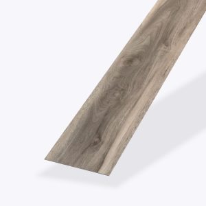A single Rio Walnut* vinyl flooring plank with a light brown, natural wood grain pattern is displayed on a light gray background.