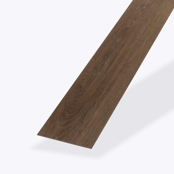 A single elongated, rectangular Sydney Oak* vinyl plank, dark brown with subtle wood grain texture and tapered edges, displayed on a white background.