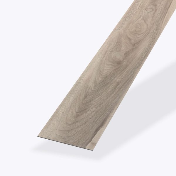 A single, angled plank of Rio Walnut* flooring with visible grain patterns is displayed against a plain white background.