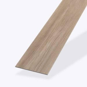 A single Tokyo Oak* light brown wood-look vinyl plank with a realistic grain pattern, displayed on a plain white background.