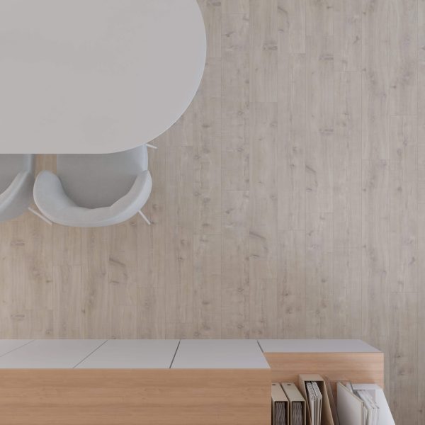 A minimalist office scene from above features a round white table, two grey chairs, and a Havanna Oak Natural Saw Cut floor, with a wooden cabinet neatly holding white binders and books.