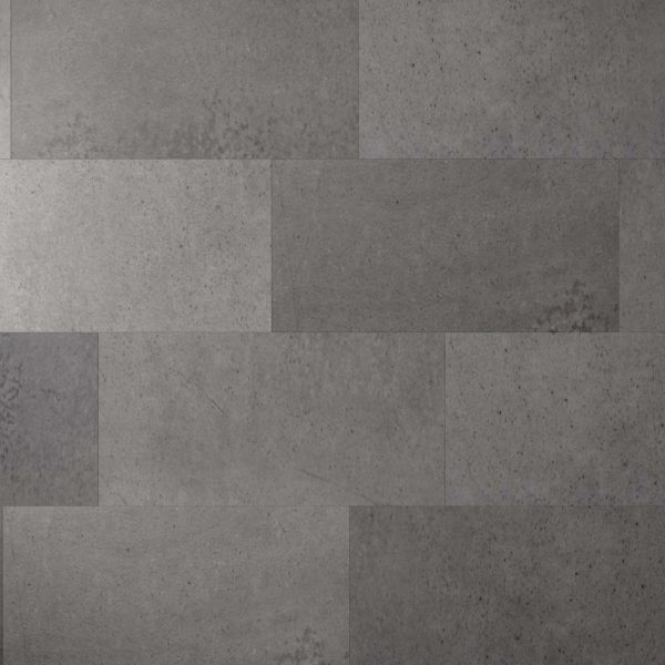 Industrial* rectangular grey concrete tiles arranged in a staggered brick pattern, featuring subtle texture and shade variations across each tile.