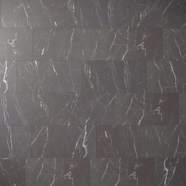 Nero features rectangular dark grey marble tiles with white and light grey veining, a smooth polished finish, and subtle shade variations. Tiles are laid in a horizontal brick pattern for a refined look.