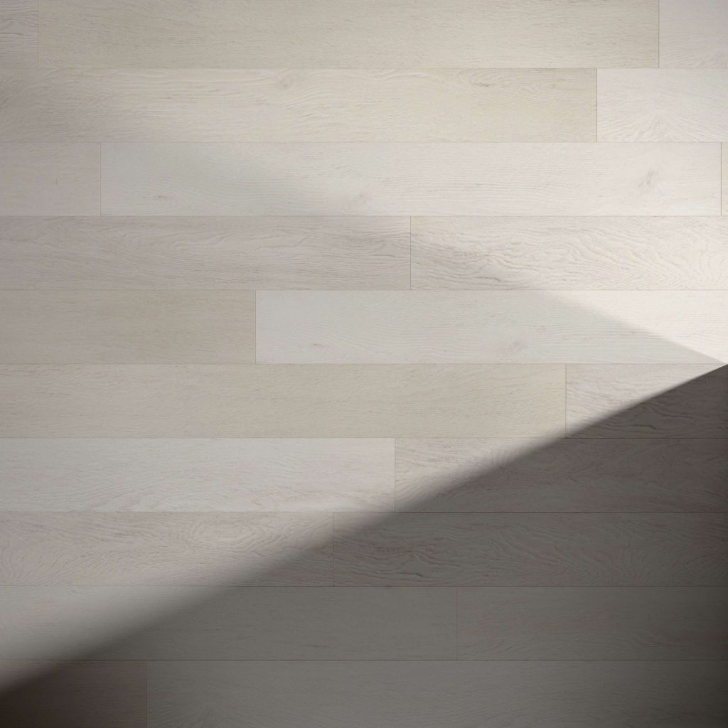 The Addington features light-colored wooden floorboards arranged horizontally, with a diagonal shadow across the lower right, highlighting the contrast between illuminated and shaded areas.