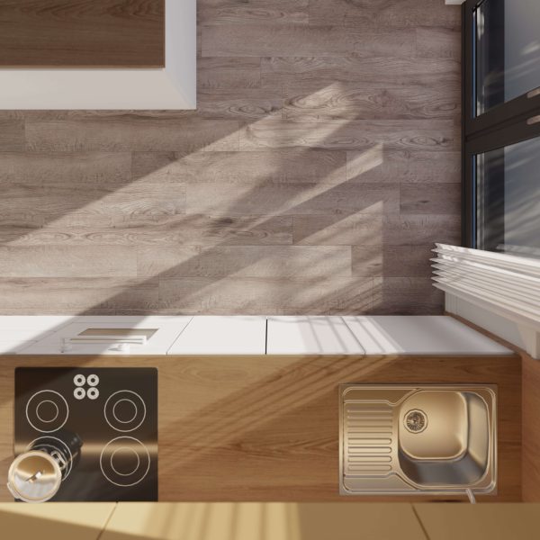 Top-down view of the Skyline kitchen, featuring a black electric stove, metal sink with drying area, white cabinets, and sunlight streaming through blinds onto a wooden floor.