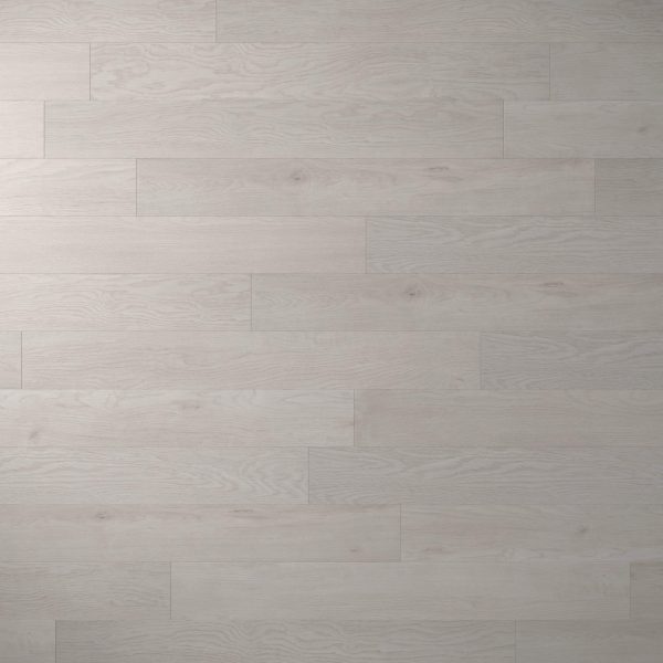Spinnaker features light gray wooden floorboards with a subtle grain, arranged horizontally in a staggered pattern. The clean, smooth surface showcases natural knots and lines for an authentic wood look.