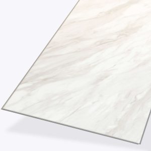 A rectangular Carrara* slab with a white and light grey marble pattern is viewed from an angle against a light background.