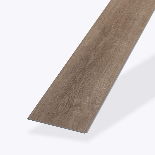 A single Merle rectangular plank of brown wood-look vinyl flooring with a realistic grain pattern is displayed on a plain, light background.
