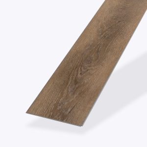 A single plank of Albion* brown wood-patterned vinyl flooring is displayed against a plain white background, showcasing its realistic wood grain texture and natural color variations.