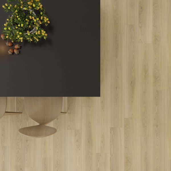 A top-down view of a dark tabletop with a leafy plant and pinecones, beside two light wooden chairs, all placed on a Genoa Oak floor.