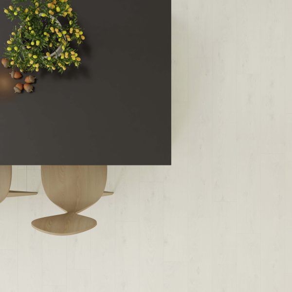 A top-down view of a rectangular black table with a green and yellow floral arrangement, two light wooden chairs, and Paloma Oak flooring. The table is positioned on the left side of the image.