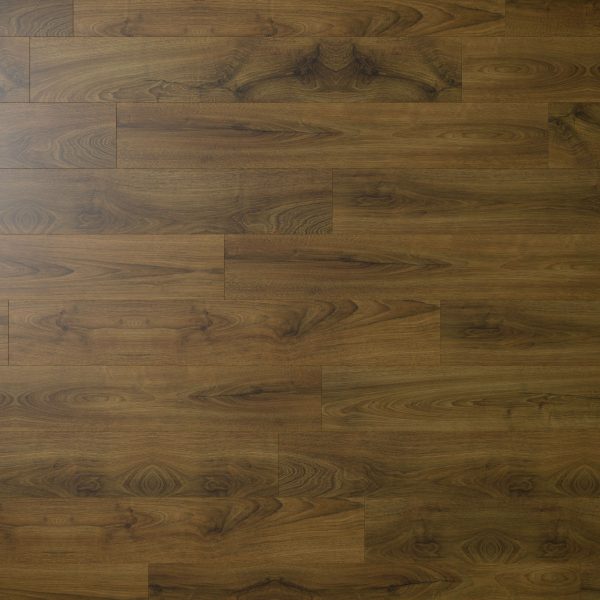 Close-up view of Charlotte Oak floor panels arranged in a staggered pattern, highlighting natural wood grain and knots in medium brown tones.