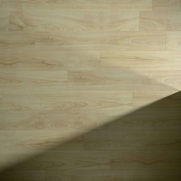 Branson Oak* light wood flooring features natural grain patterns highlighted by sunlight, with a diagonal shadow crossing the bottom right corner to create contrast between lit and shaded areas.