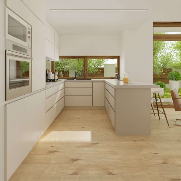 Modern kitchen features Bowery Oak floors, white cabinets, built-in microwave and oven, large windows with green views, and an island with seating. The space is bright, airy, and boasts a minimalist design.