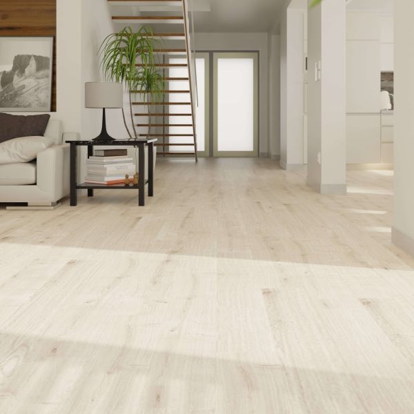 Modern living space featuring Laurel Oak flooring, white walls, a staircase with wooden steps and metal railing, a beige sofa, a small black table with magazines, a plant, and large frosted glass double doors in the background.