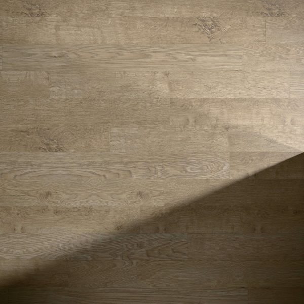 Old Oak Matt Oiled* wooden floor in light brown, showcasing natural grain patterns and sunlight casting a soft diagonal shadow across the lower right corner.