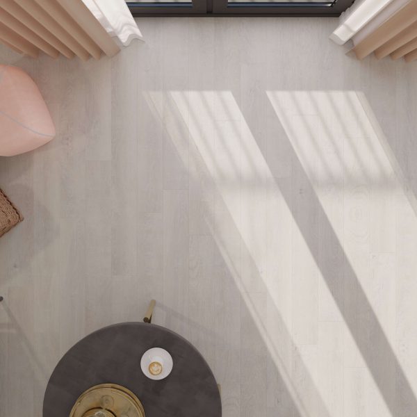 Minimalist room featuring Venice Oak Light flooring, soft sunlight through large windows with beige curtains, a round dark table with decor, and a pale pink chair partially visible in the corner.