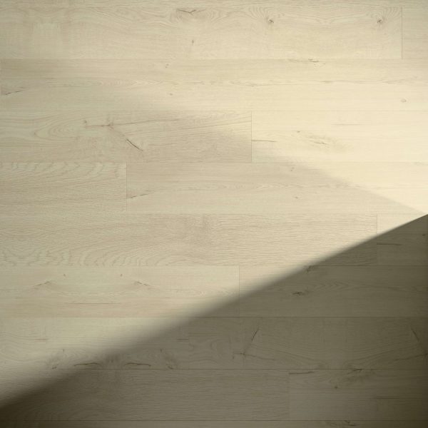 Minerva Oak flooring features a light wood tone with a diagonal shadow across the lower right, accentuating its natural grain and subtle surface texture.
