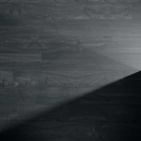 Erebus Oak dark wood floor features visible grain patterns, partially covered by a diagonal shadow cast from the right side.