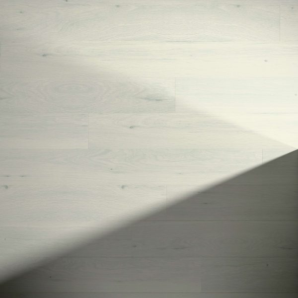 Damon Oak flooring features light wood tones with a subtle grain pattern, while a diagonal shadow from the lower left to upper right highlights the contrast between illuminated and shaded areas.