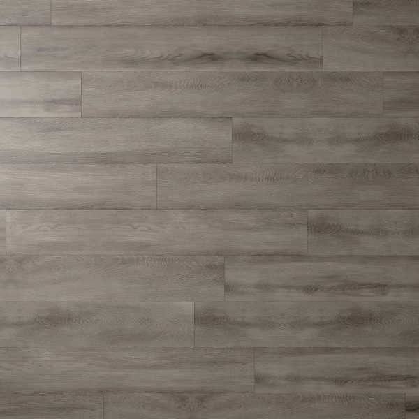 Rochefort Oak features gray wooden floorboards arranged in a staggered pattern, with a subtle wood grain texture, a smooth matte finish, and slight shade variations for a naturally modern look.