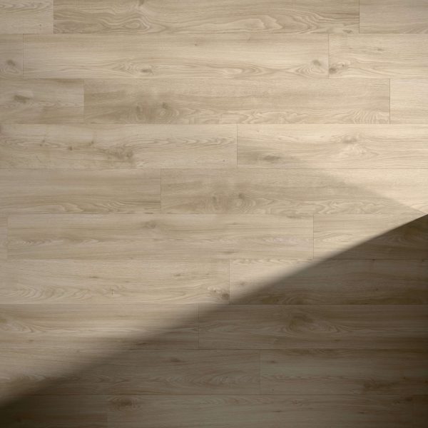 Wayne* features light wood flooring with a natural grain. A diagonal shadow falls on the lower right, while the upper left is brightly lit. The clean, smooth surface highlights the refined appearance of Wayne*.