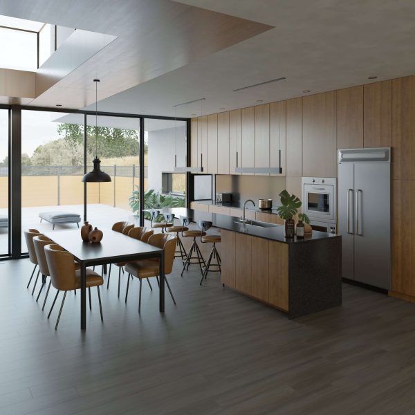 The Tollymore* features a modern kitchen and dining area with wooden cabinets, stainless steel appliances, island with bar stools, large dining table and chairs, pendant light, and floor-to-ceiling windows to the patio.