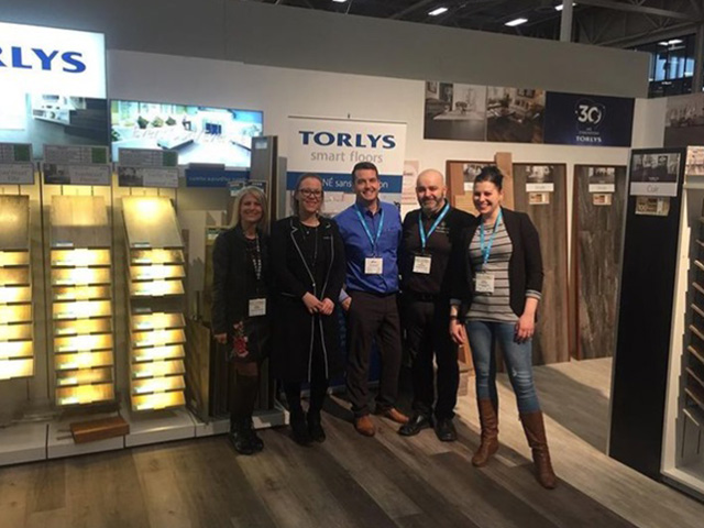 TORLYS employees at trade show